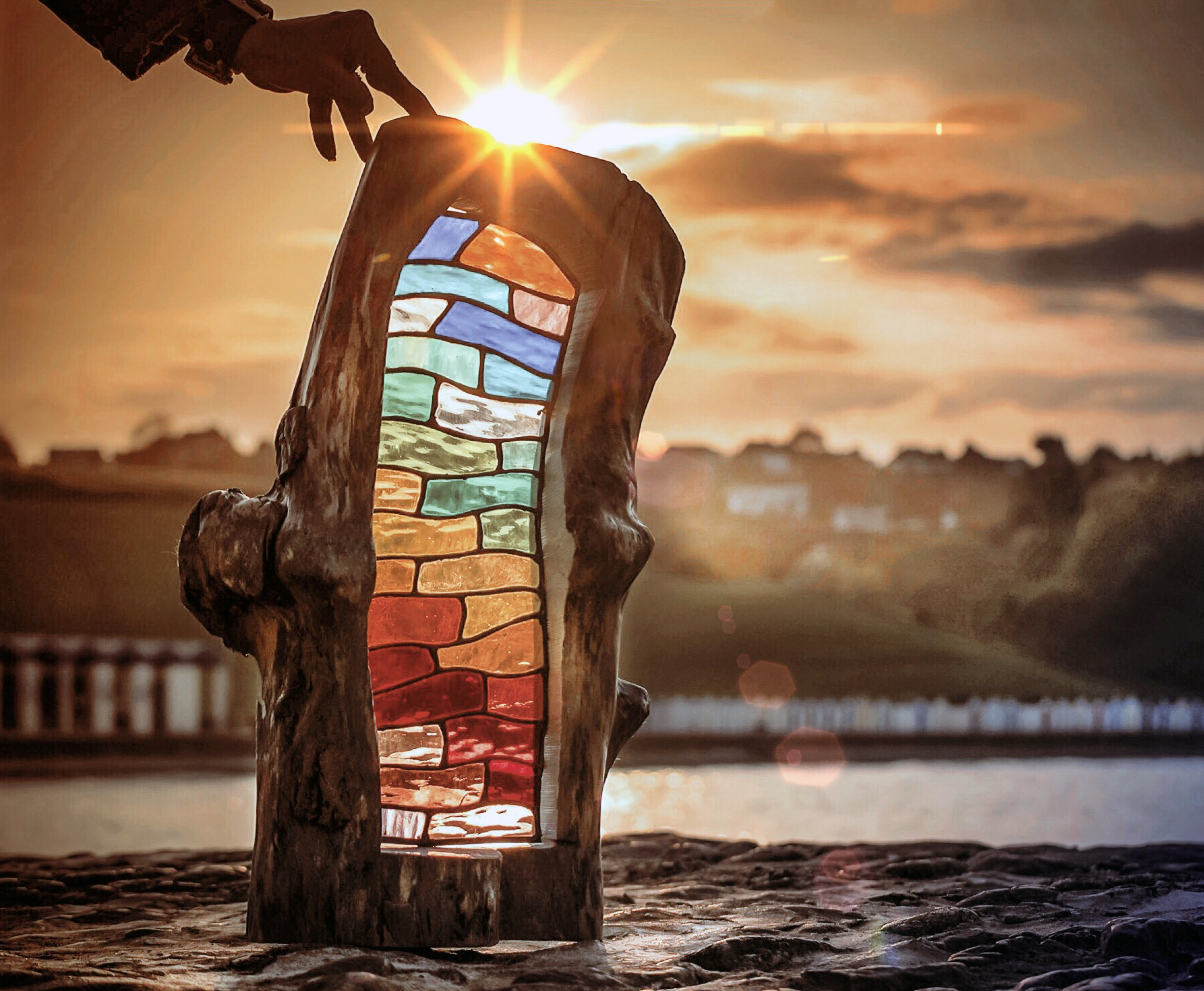 A stained glass and wood obelisk